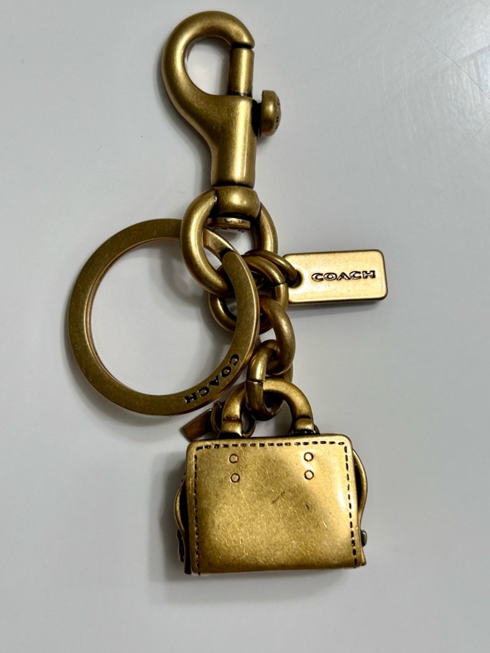 Coach brass rogue, keychain charm hard to find